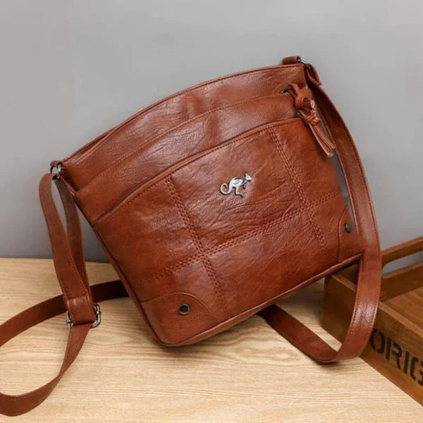 Alina – Crossbody i veganskt läder med organiserade fickor